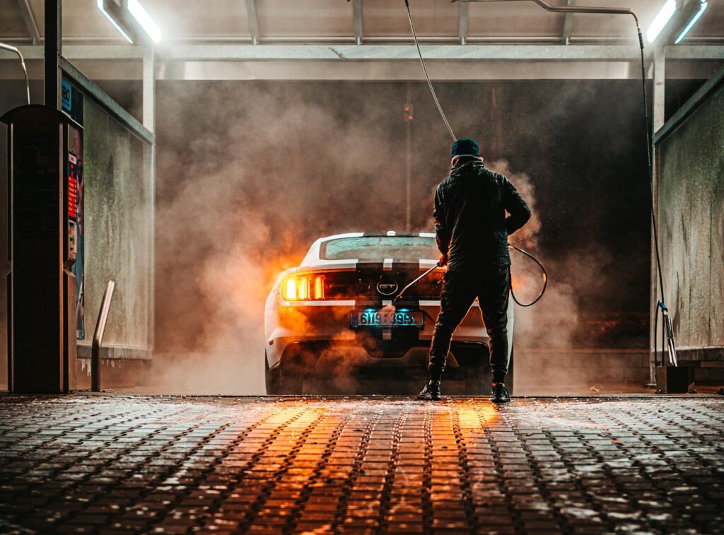 Car Being Wash by Man